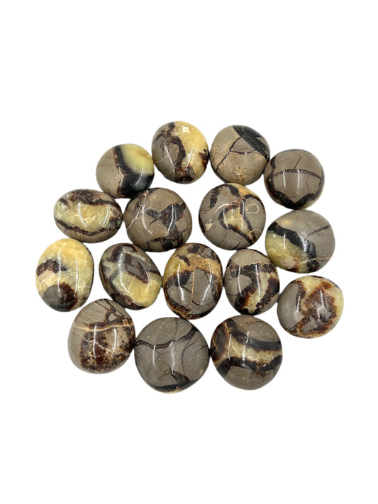 Round marbled stones on a white background