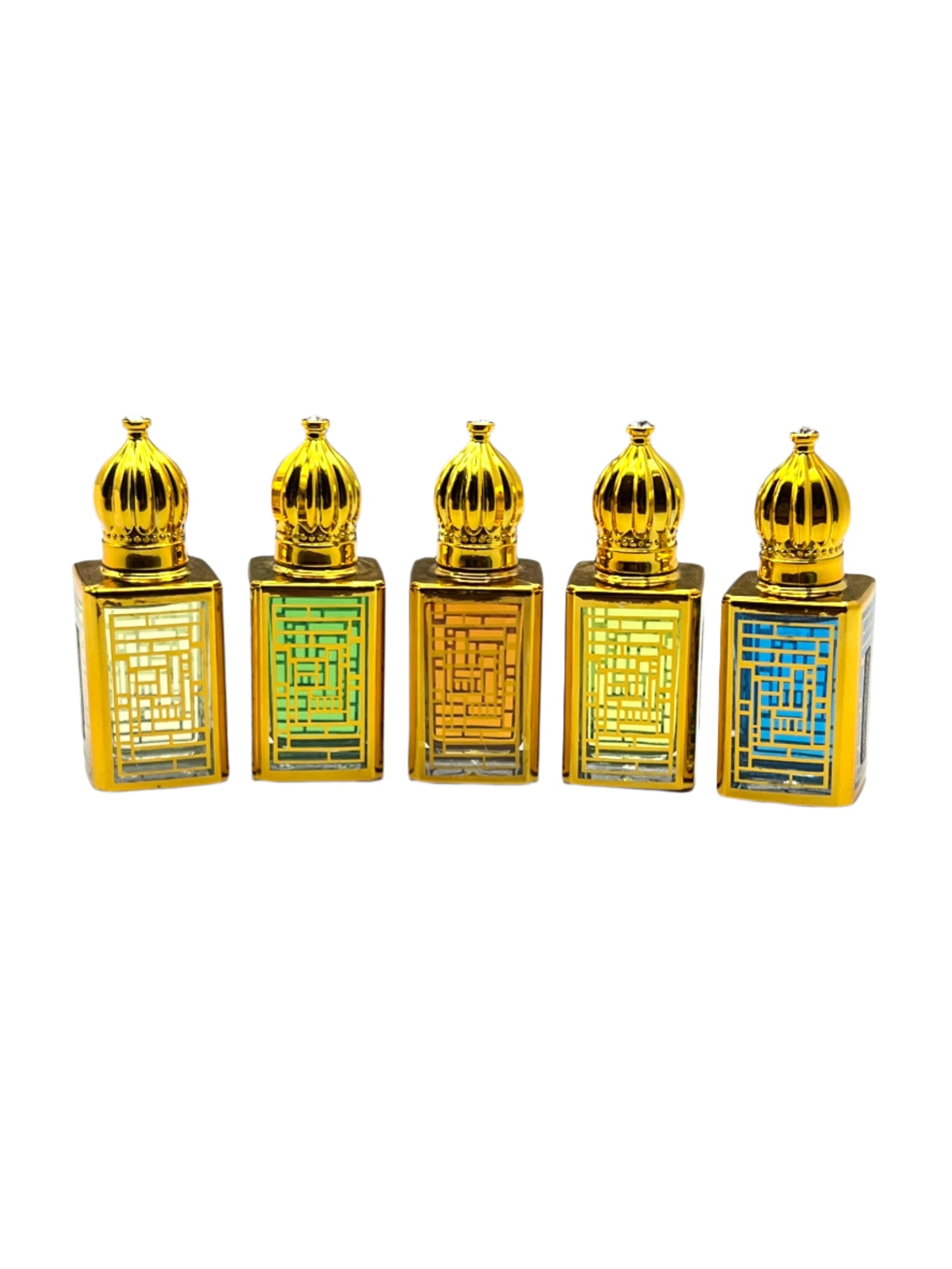 Five gold-colored perfume bottles with intricate designs on a reflective surface.