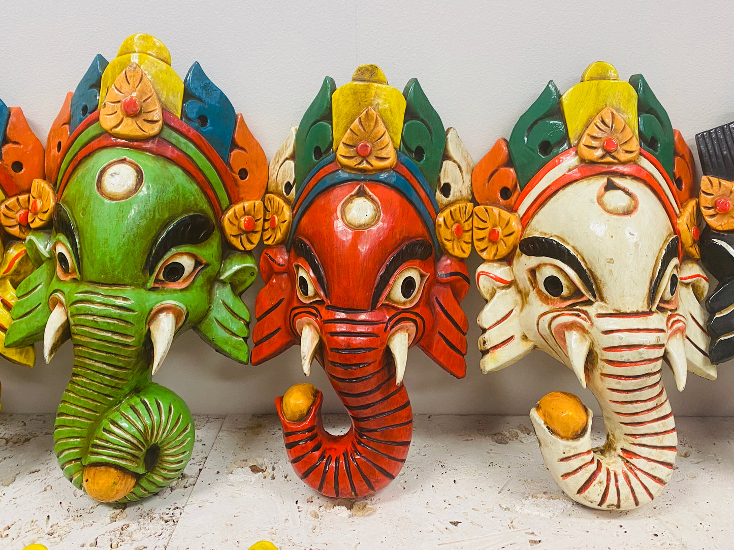 Hand Carved and Painted Ganesh Masks from Nepal - Available in 3 Sizes