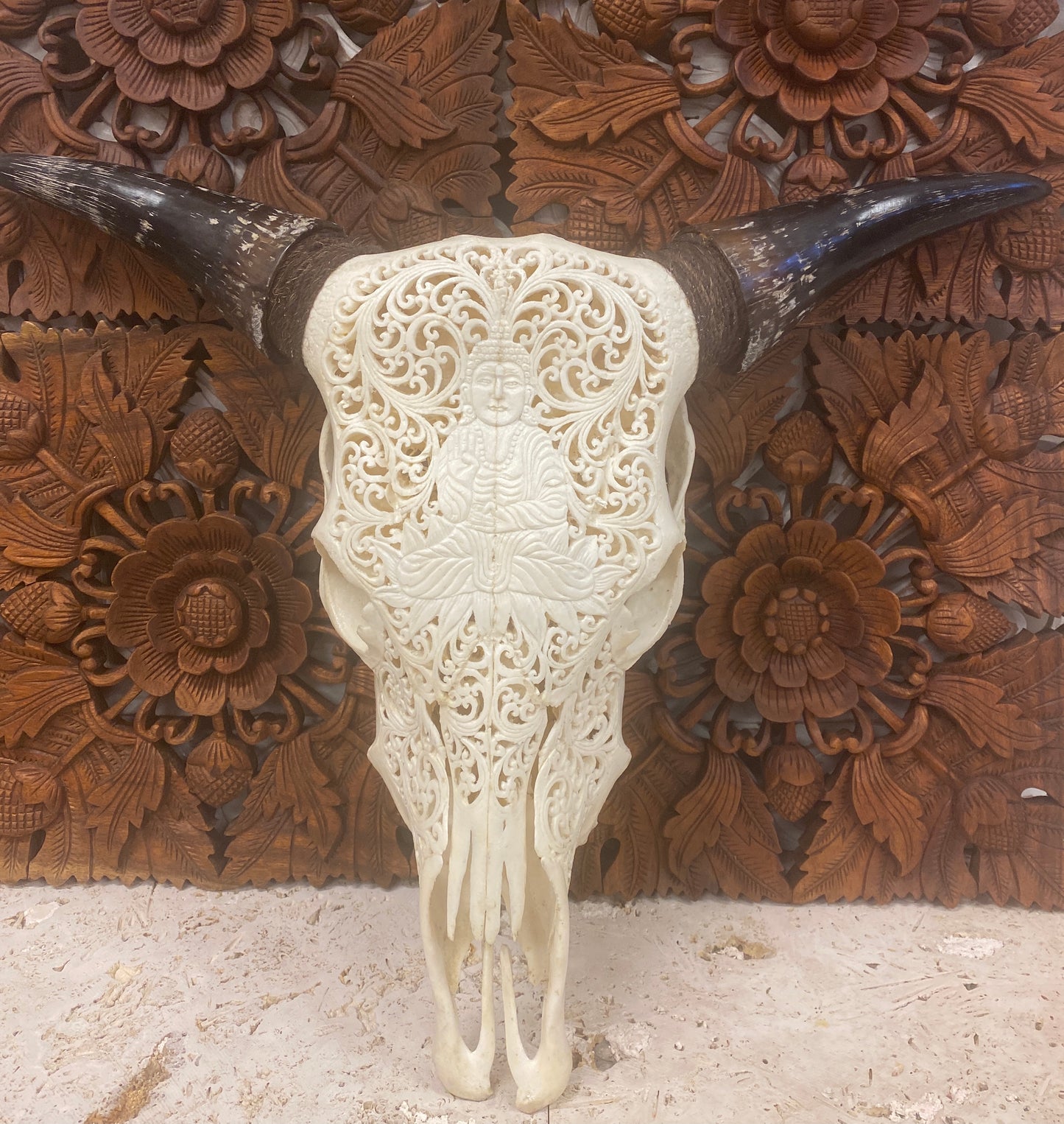 Intricately Carved Buffalo Skulls with Buddha