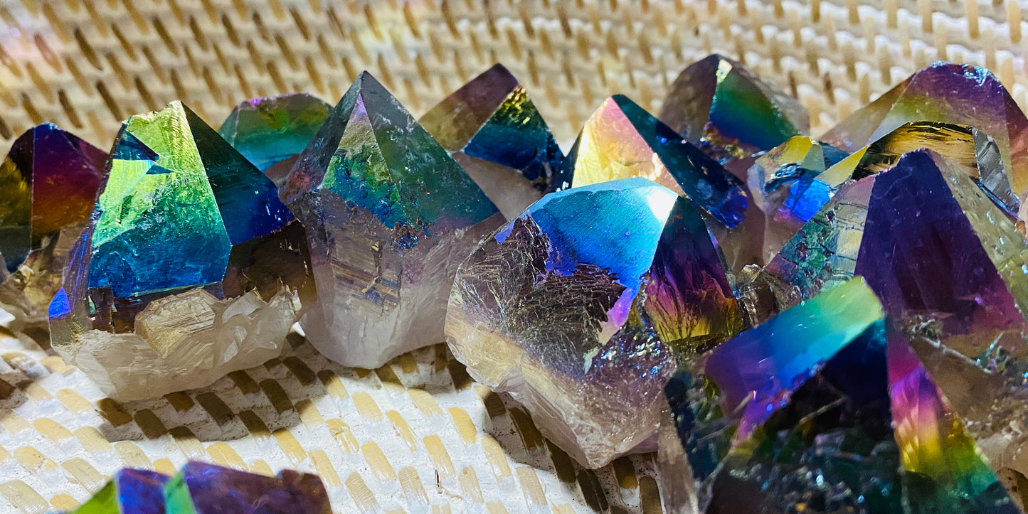 Rainbow Aura Quartz Crystal Base Cut Points