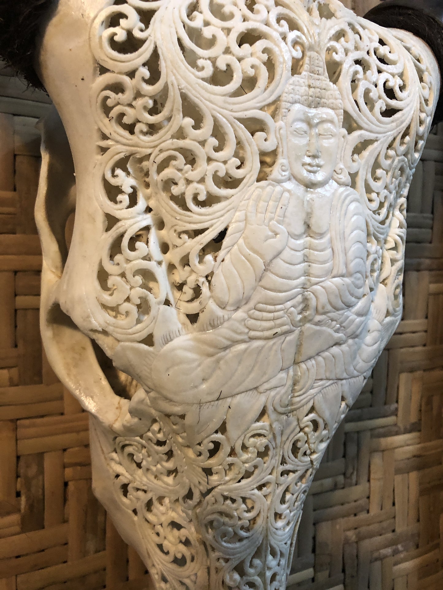 Intricately Carved Buffalo Skulls with Buddha