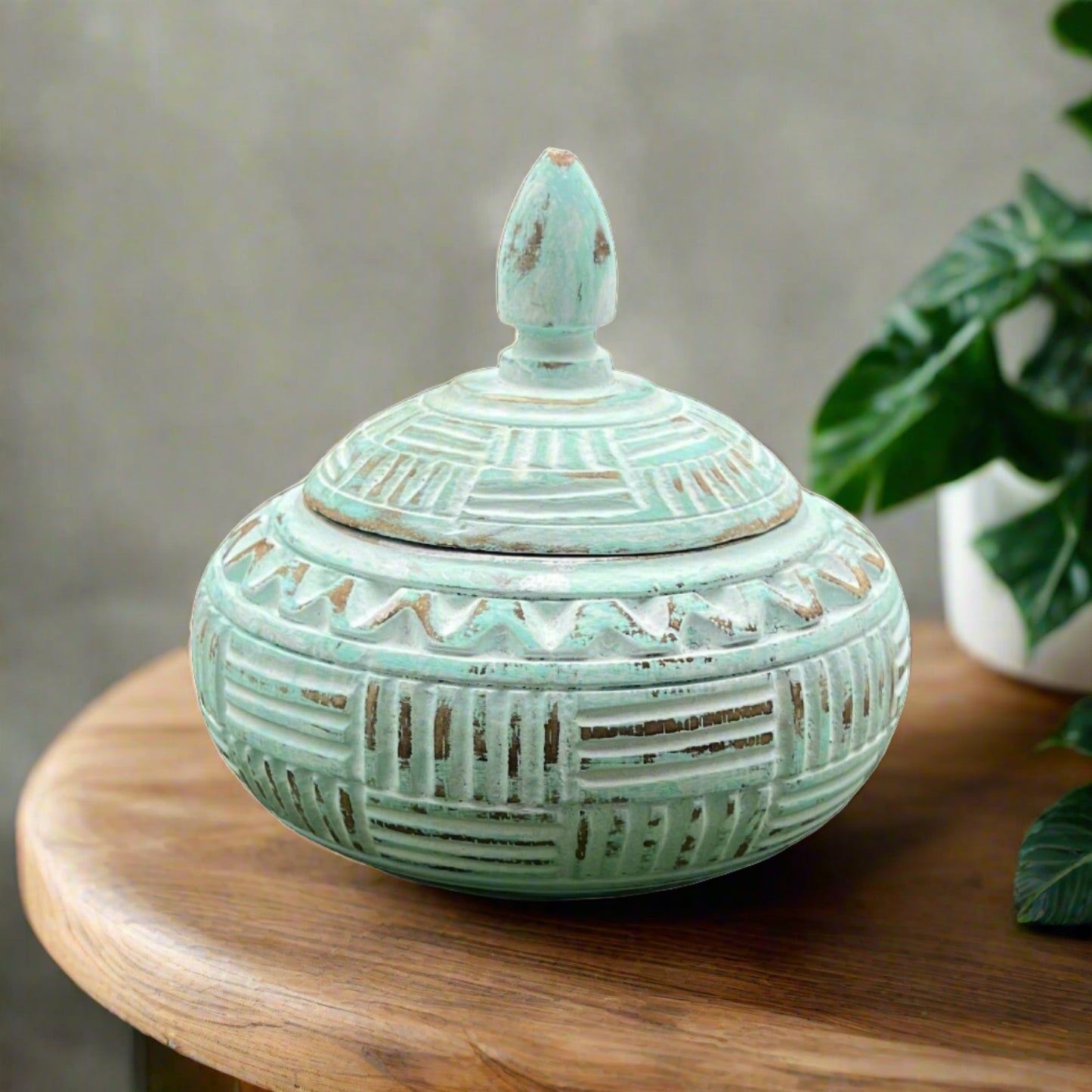 Hand carved blue bowl with lid, front view