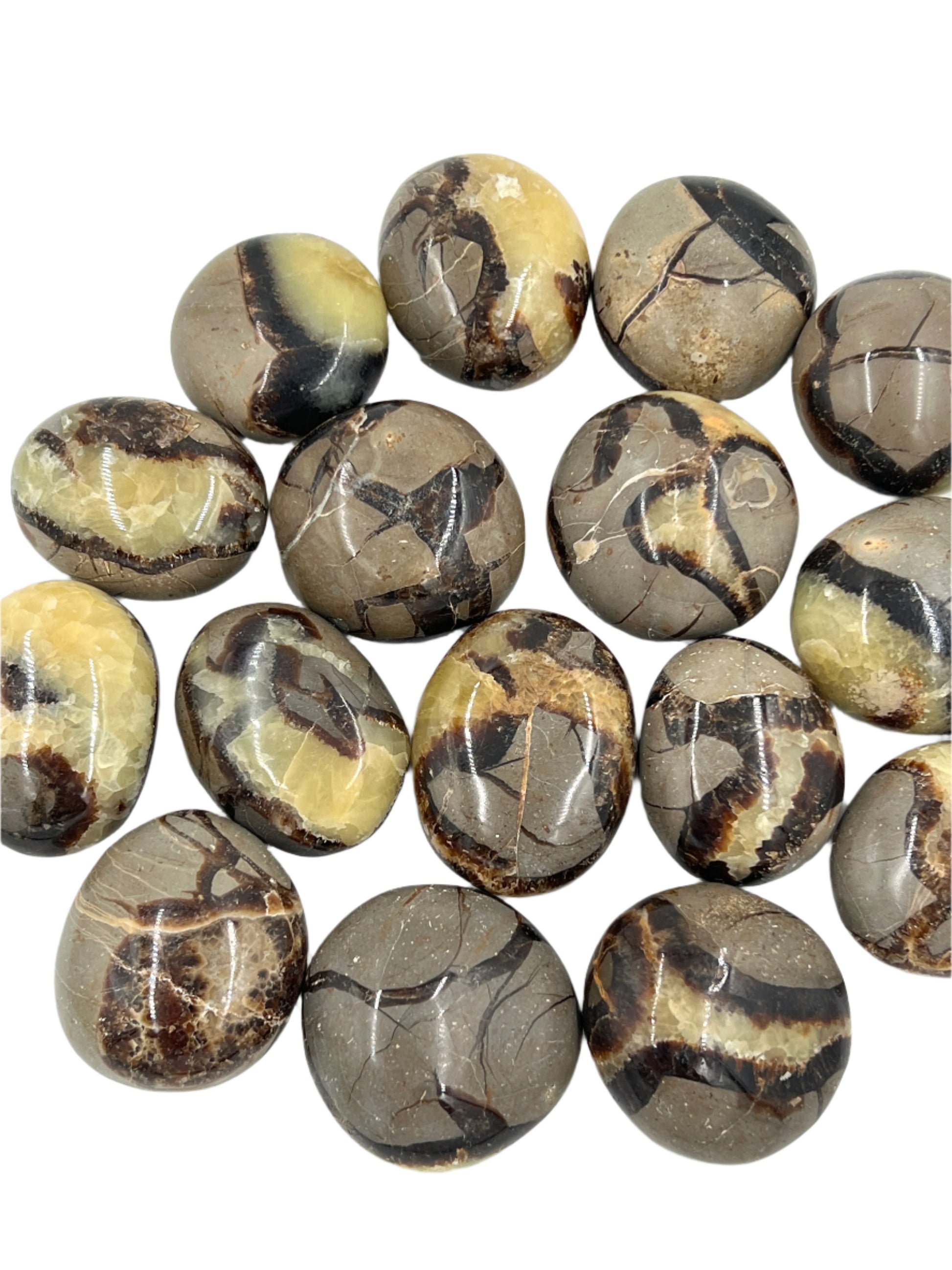 Collection of marbled stones on a white background