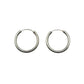 Pair of silver hoop earrings on a light gray background