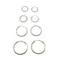Set of silver hoop earrings on a light gray background