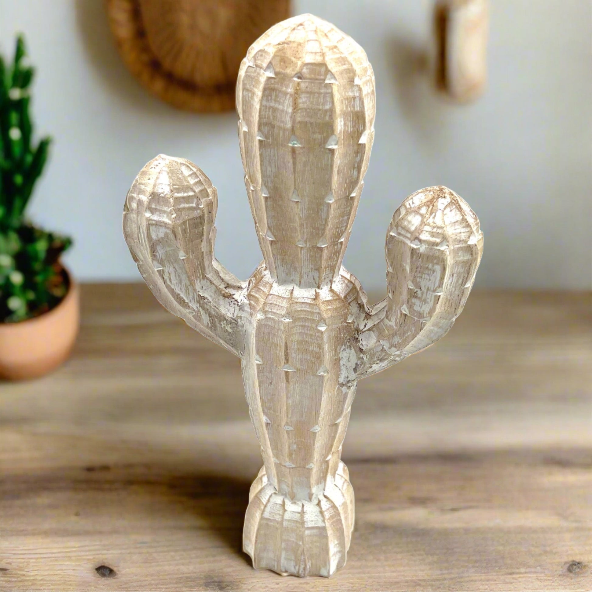 white carved cactus, side view