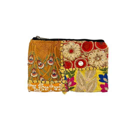 Colorful embroidered pouch on a white background