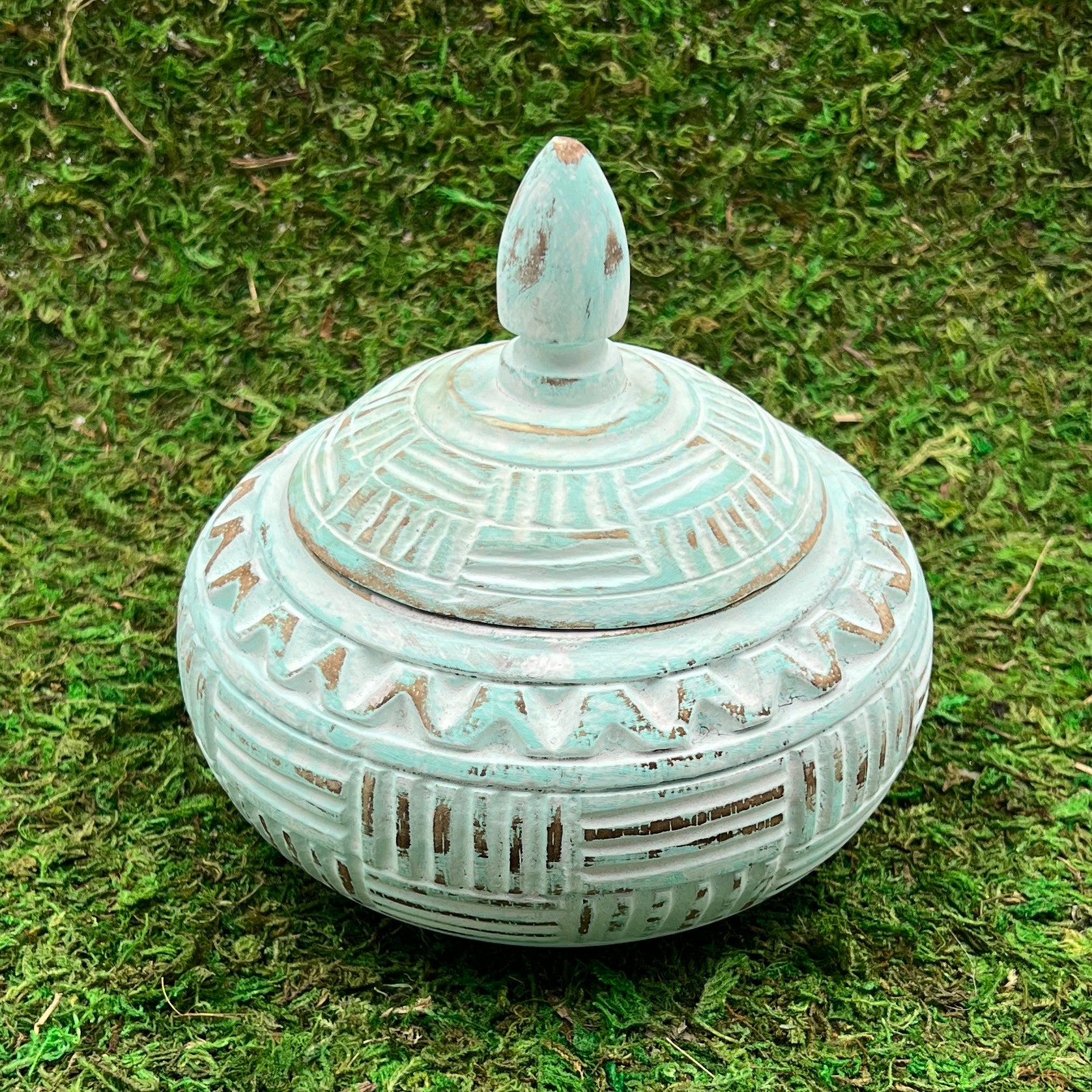 Hand carved blue bowl with lid, above view