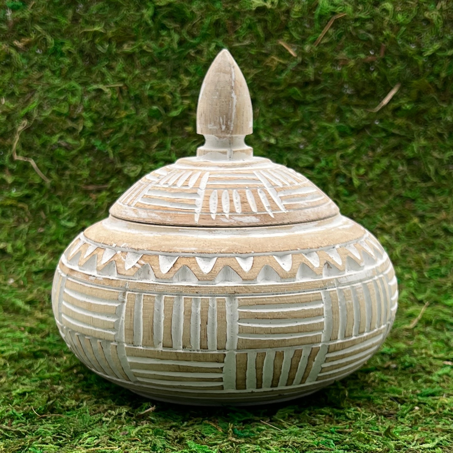 Hand carved white bowl with lid, side view