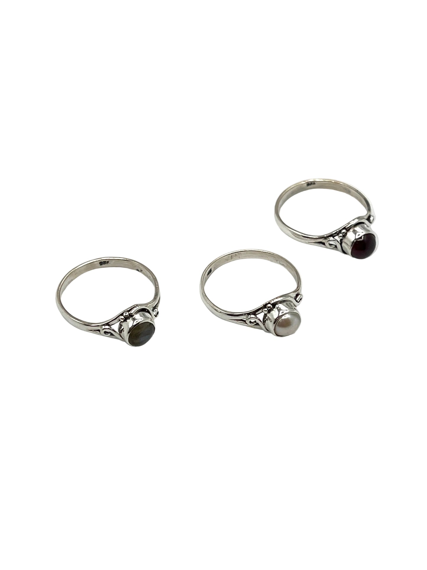 Round Gemstone Swirl Rings