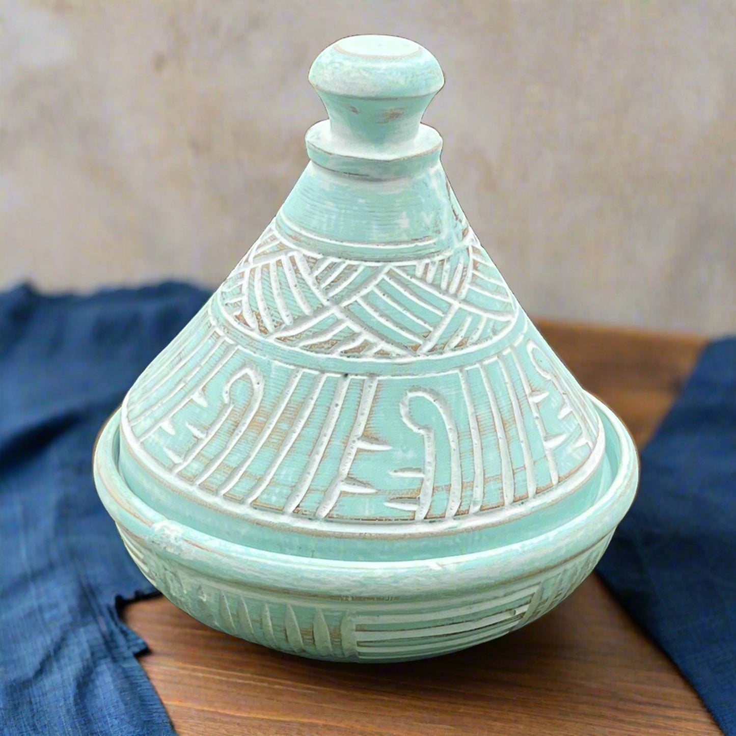 Hand carved blue bowl with lid, front view