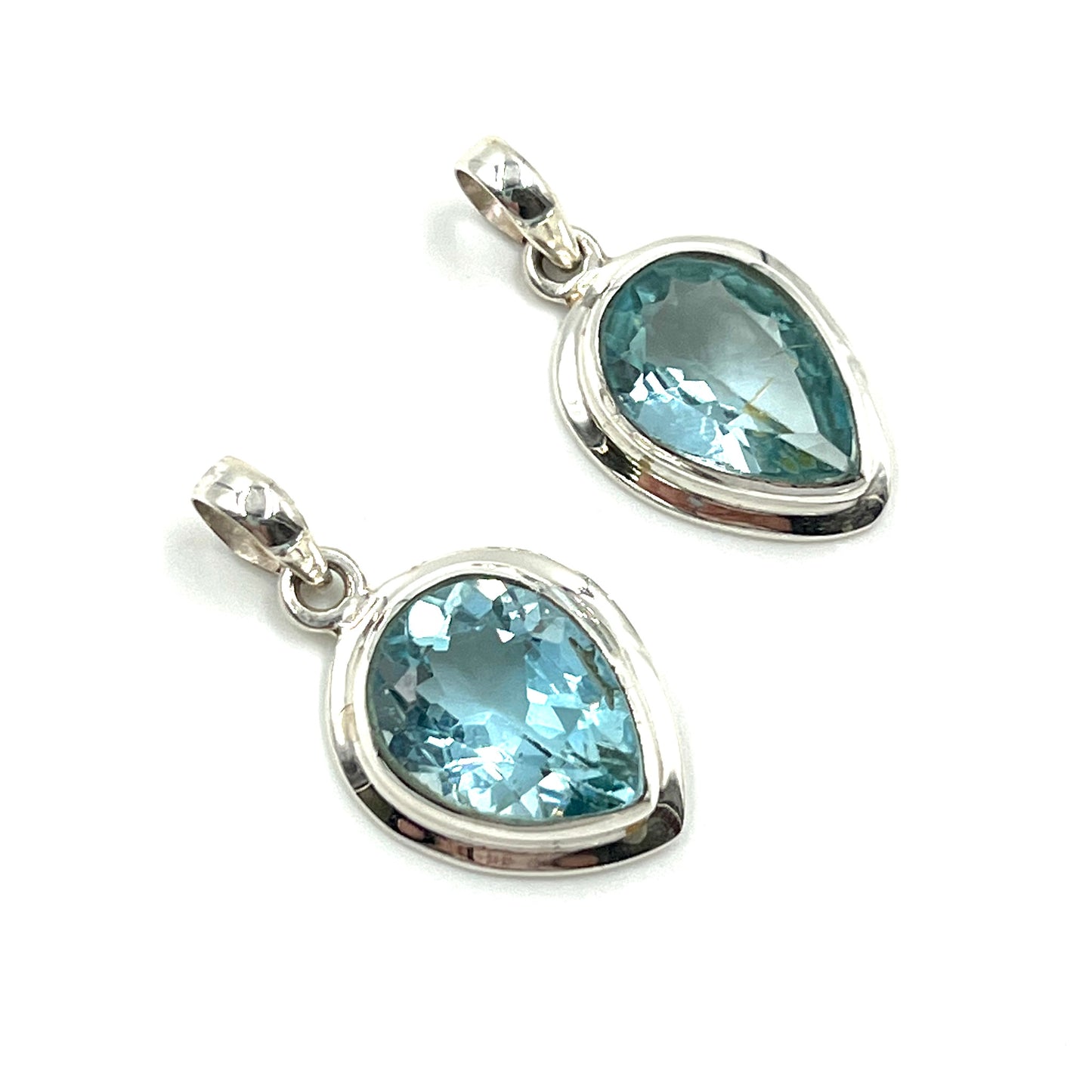 Sterling Silver Tear Drop Blue Topaz Pendants