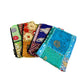 Set of colorful fabric pouches on a white background