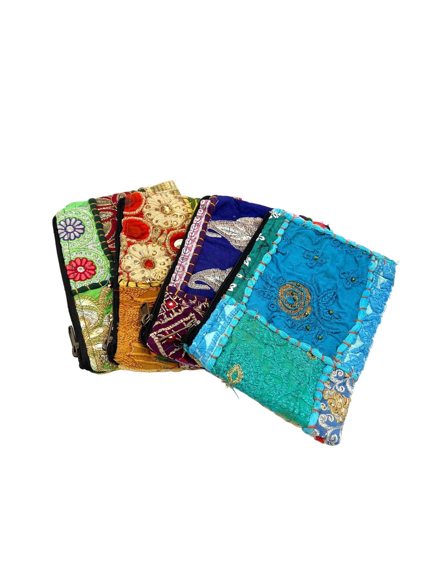 Set of colorful fabric pouches on a white background
