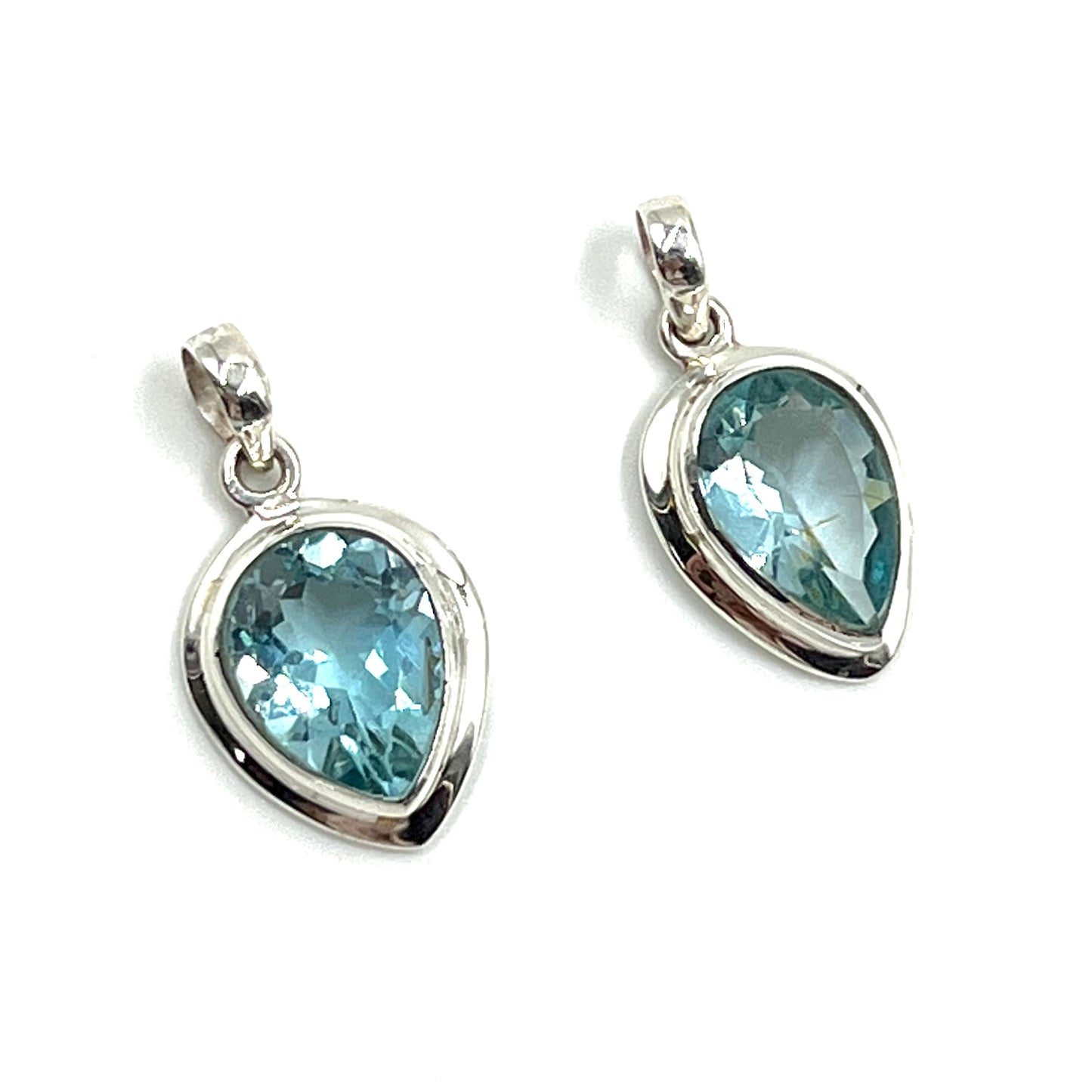 Sterling Silver Tear Drop Blue Topaz Pendants