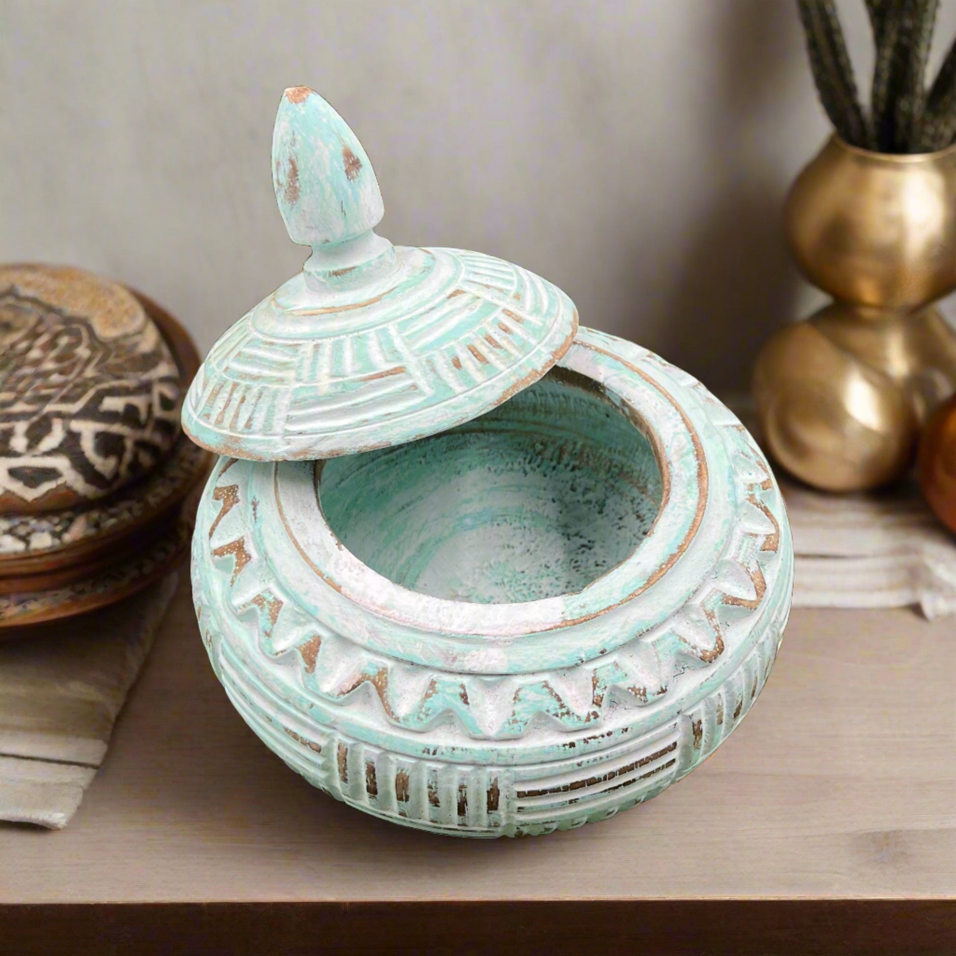 Hand carved blue bowl with lid open, front view