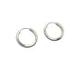 Pair of silver hoop earrings on a gray background