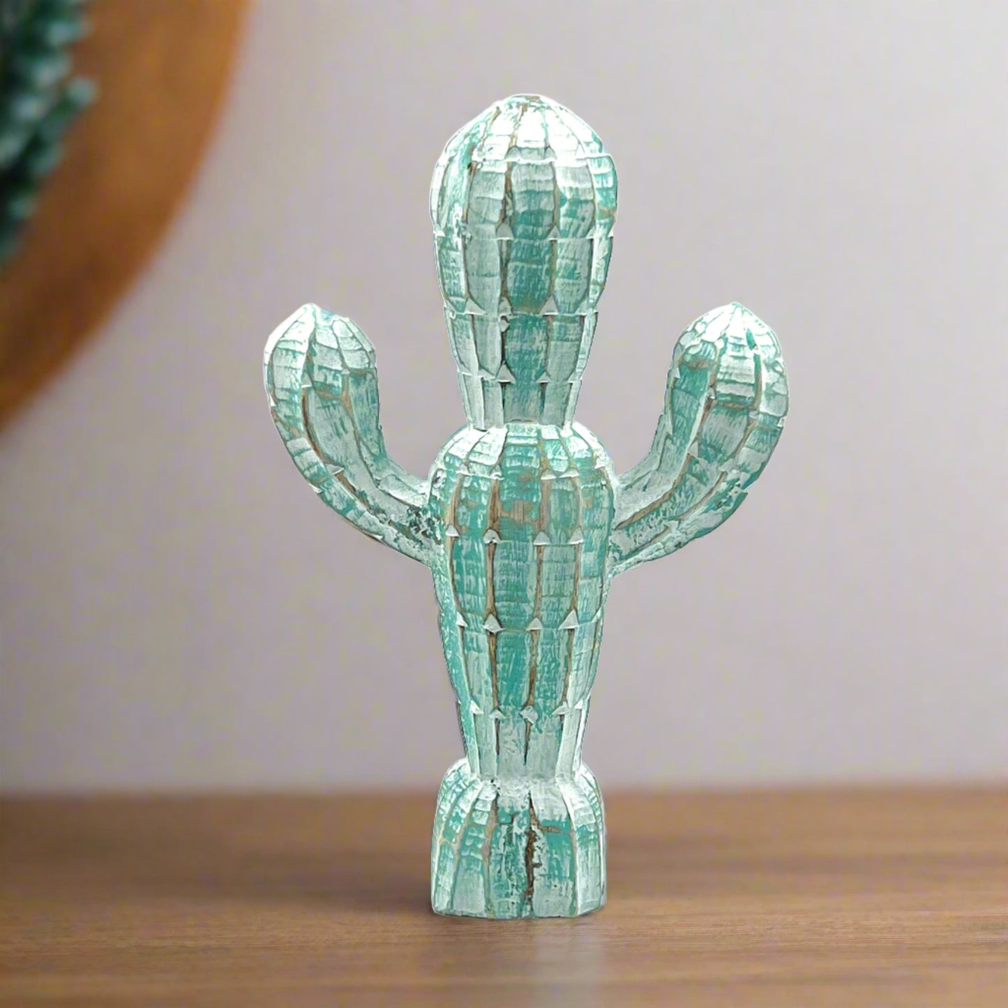 blue hand carved wood cactus, front view