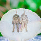 Spaceman Earrings by Carlos Montanaro & Crystal Rivera