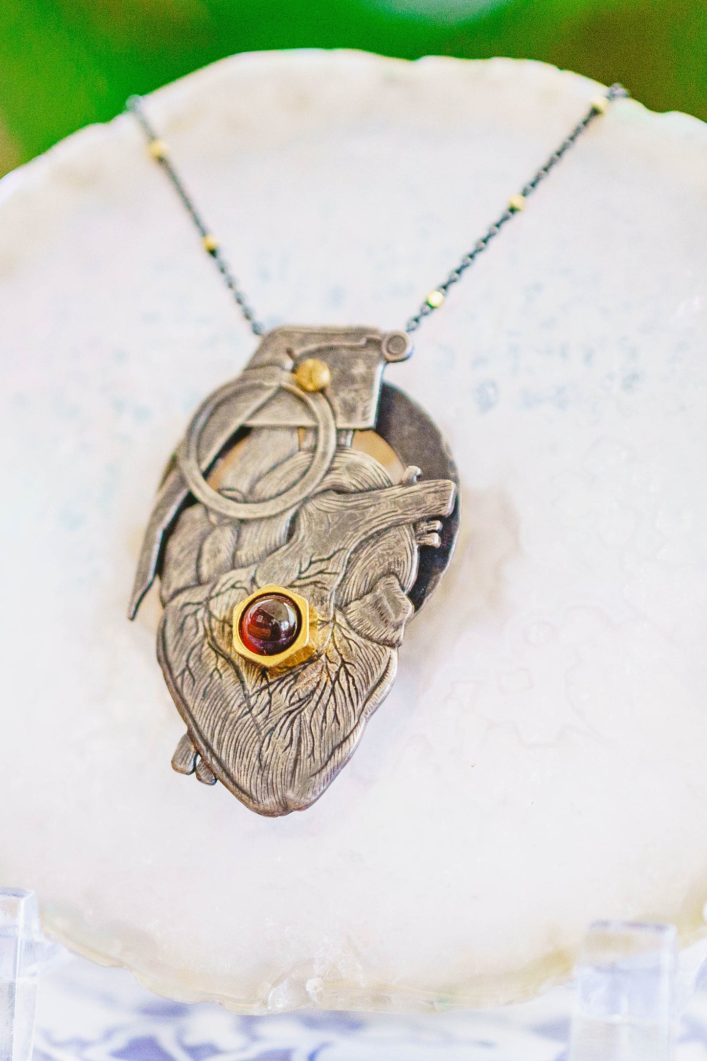 Heart Grenade Necklace by Carlos Montanaro & Crystal Rivera