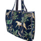 Tote bag with jungle animal pattern on a white background