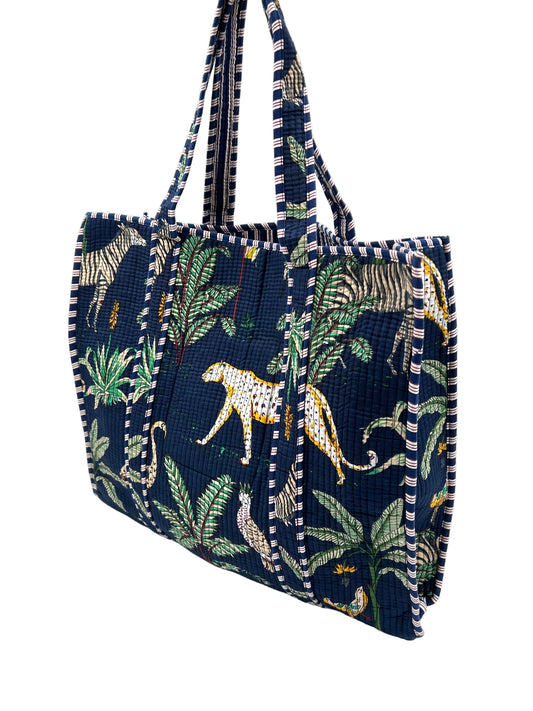 Tote bag with jungle animal pattern on a white background