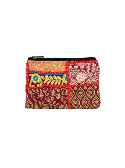 Multicolored patchwork pouch with intricate patterns on a white background
