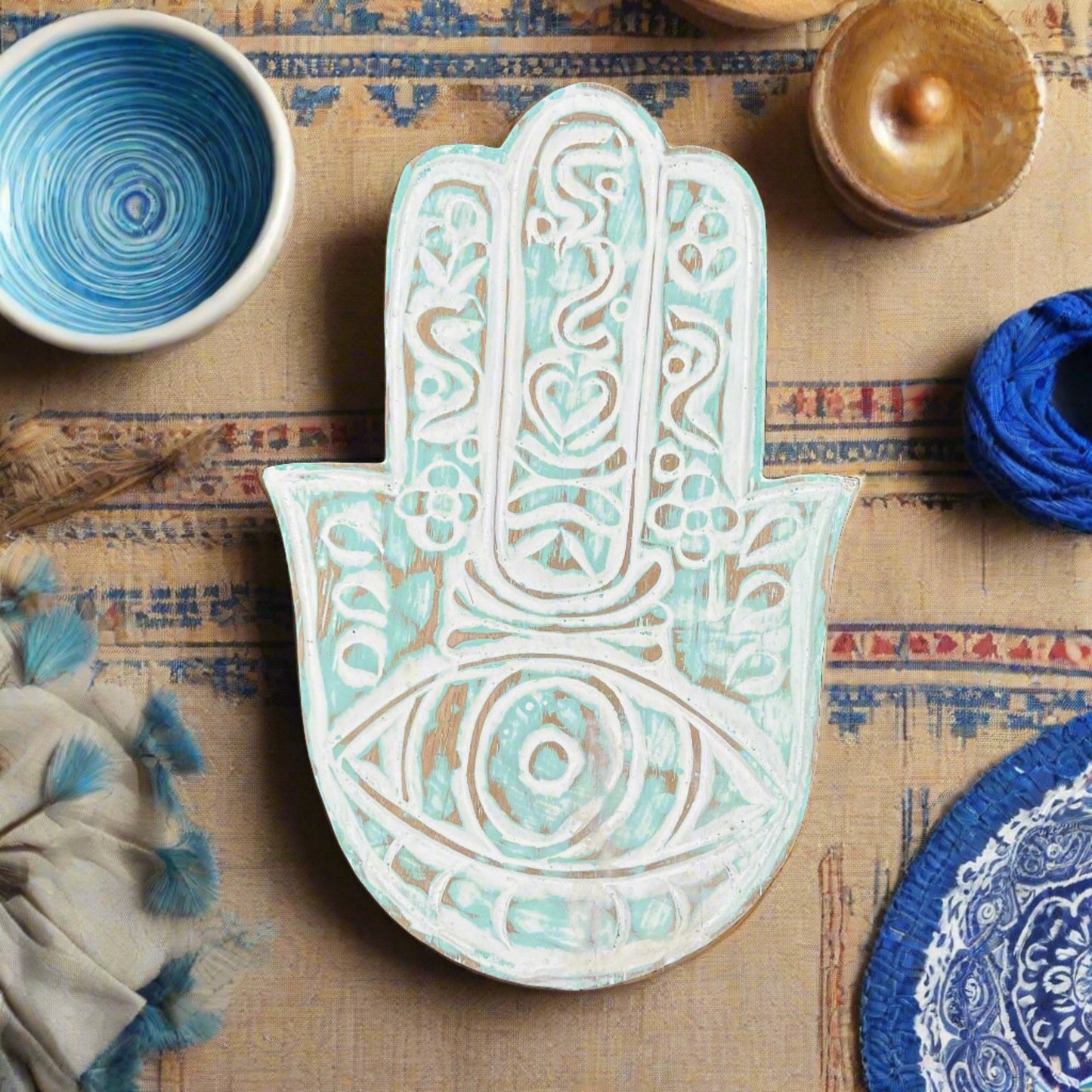 hand carved hamsa hand blue wood plate, from top 