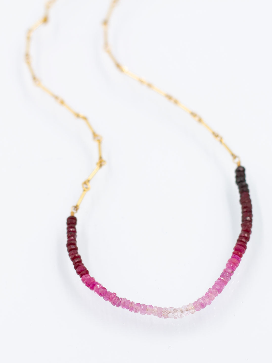 Shimmering Faceted Strands: Ruby Collection