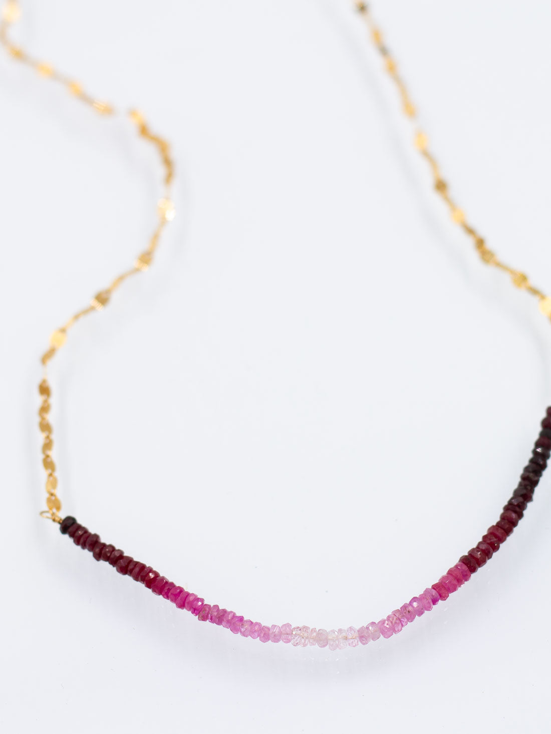 Shimmering Faceted Strands: Ruby Collection