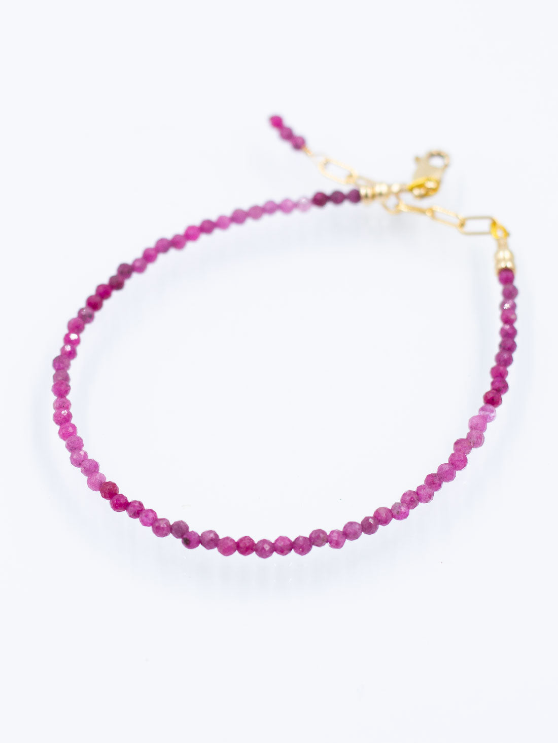 Shimmering Faceted Strands: Ruby Collection