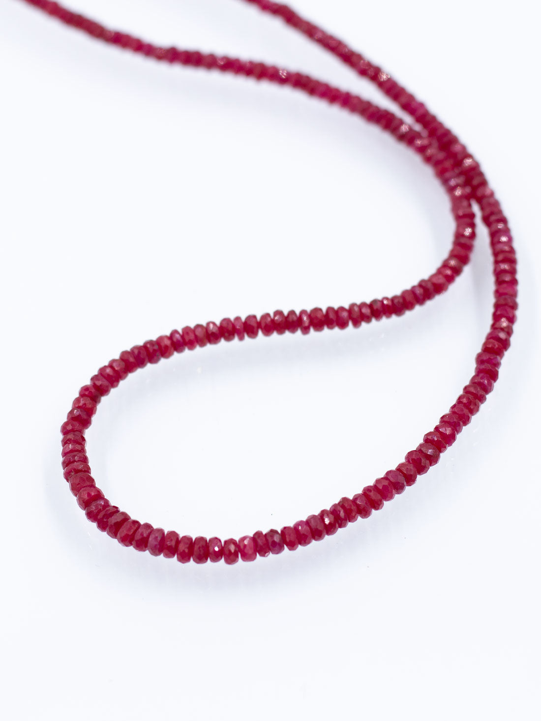 Shimmering Faceted Strands: Ruby Collection