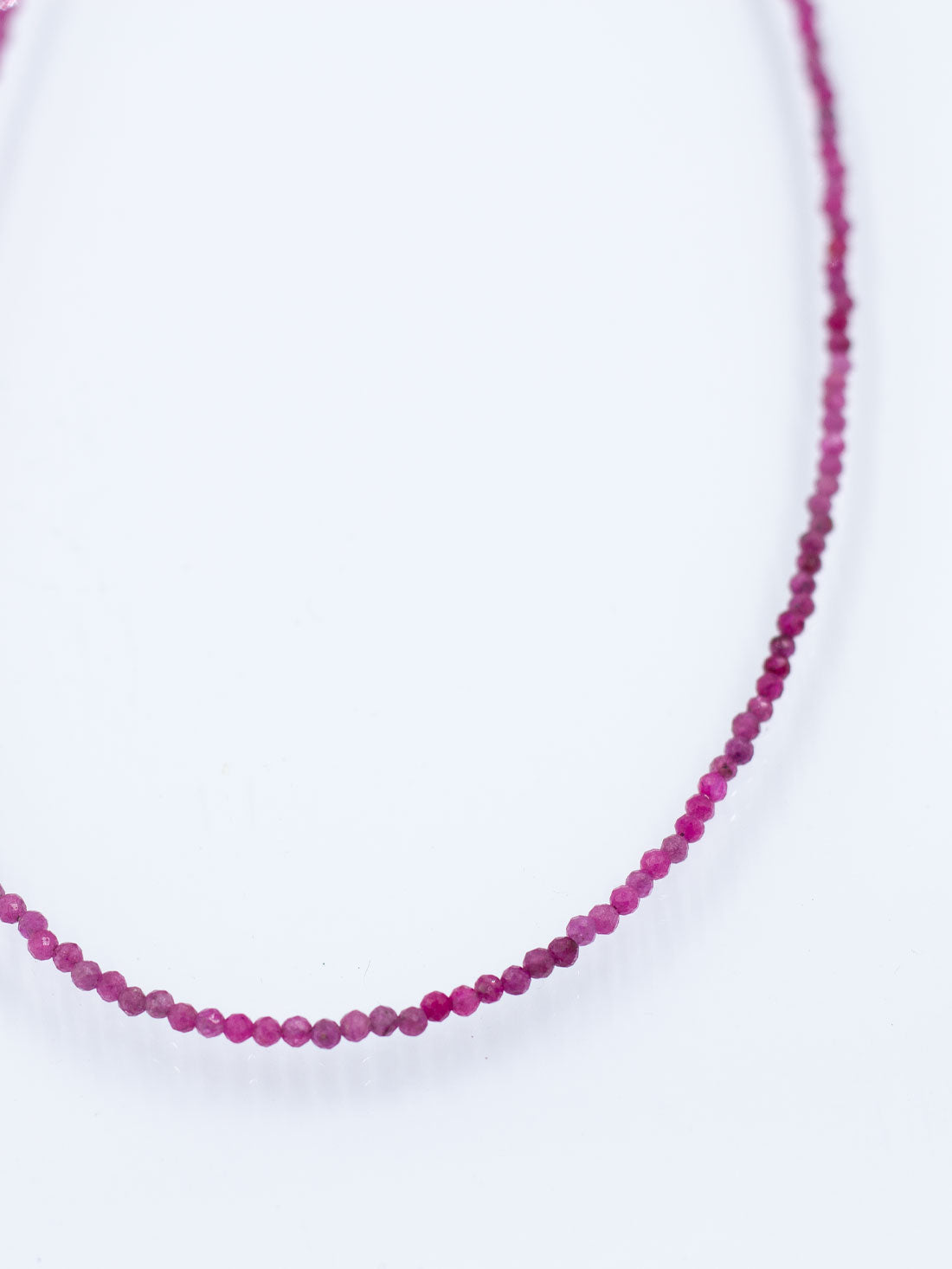 Shimmering Faceted Strands: Ruby Collection