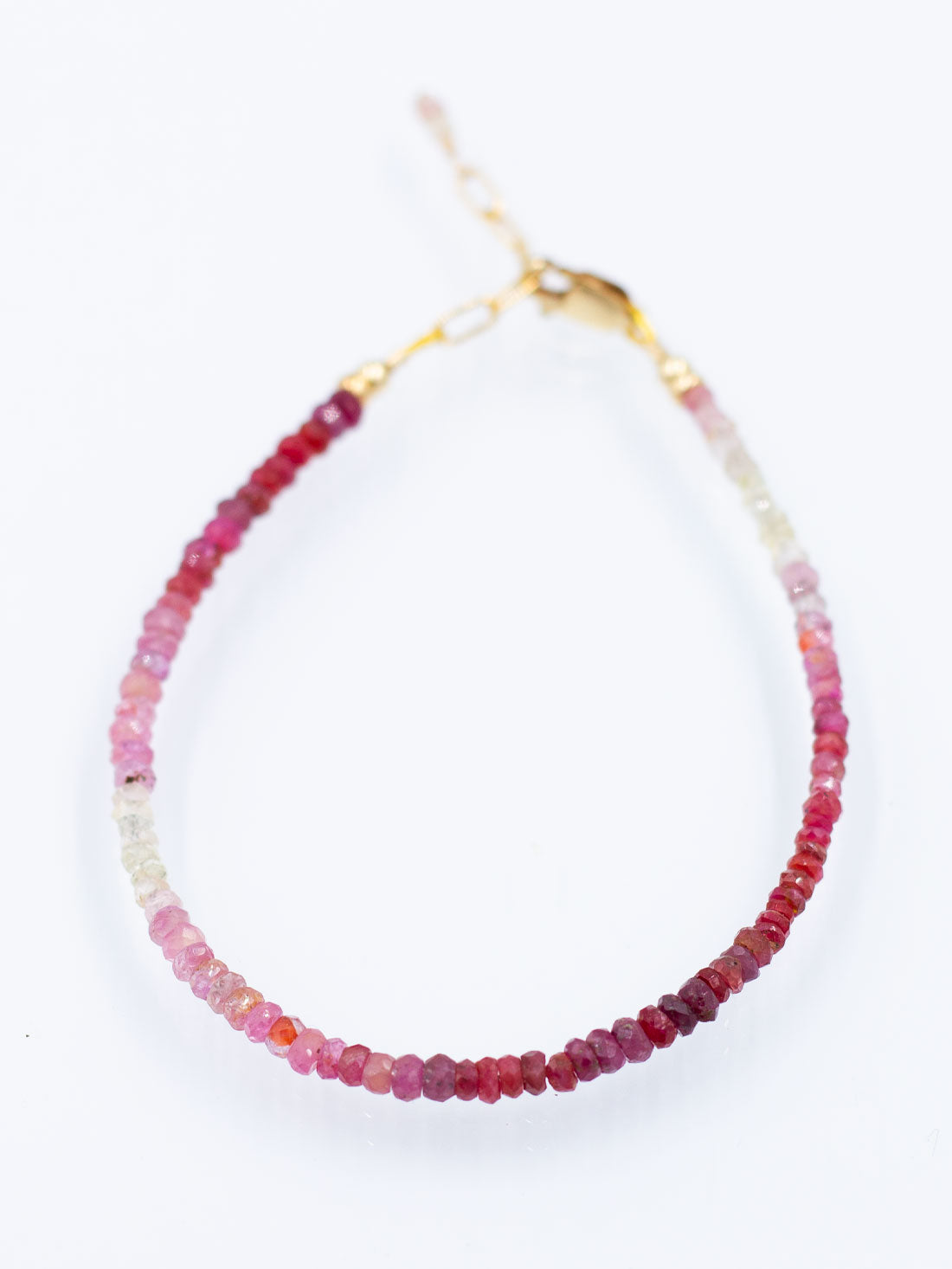 Shimmering Faceted Strands: Ruby Collection