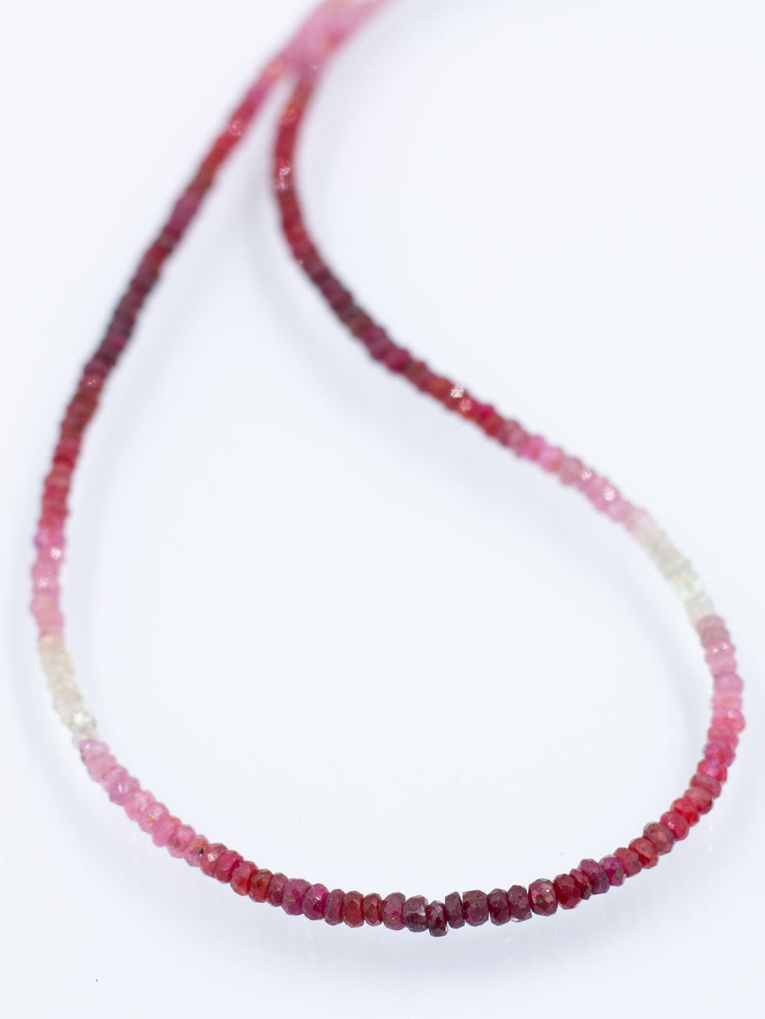 Shimmering Faceted Strands: Ruby Collection