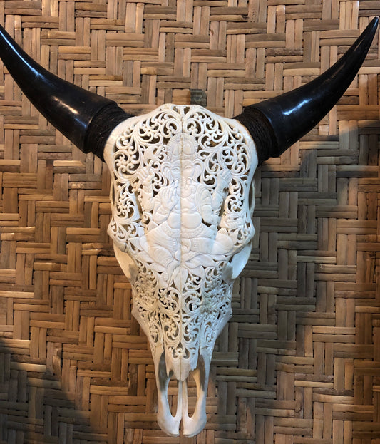 Intricately Carved Cow Skulls with Ganesh