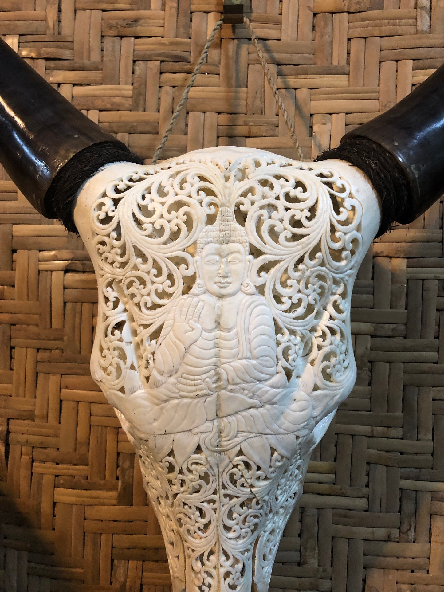 Intricately Carved Buffalo Skulls with Buddha