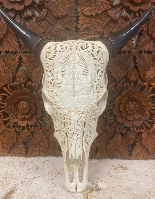 Intricately Carved Skulls with Ganesh
