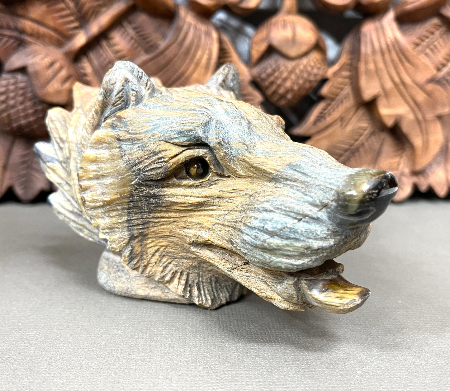 Carved Tigers Eye Wolves