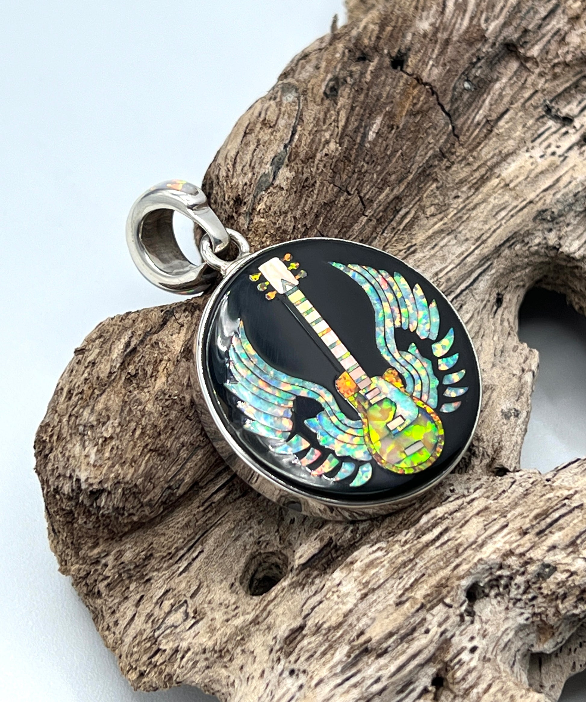 Rare Inlaid Gemstone Winged Guitar Pendant by David Freeland Rare Inlaid Gemstone Winged Guitar Pendant by David Freeland